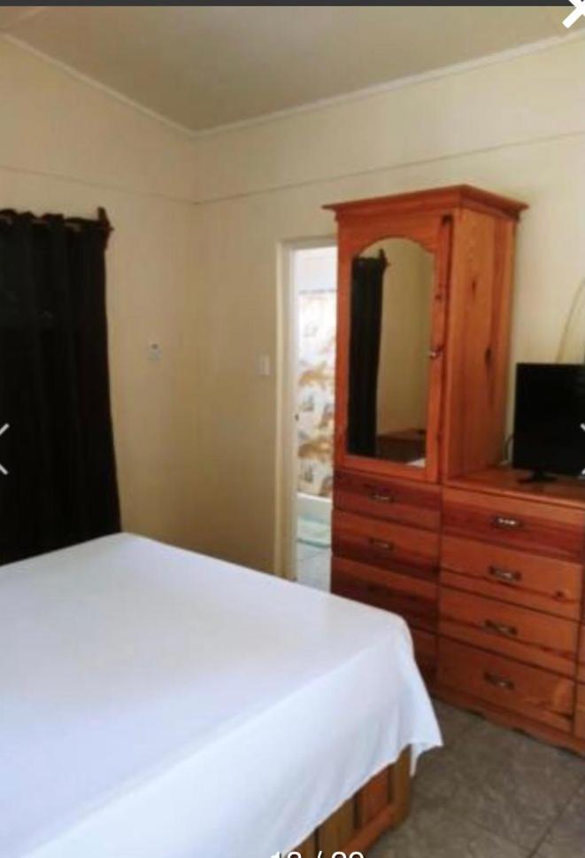 Andre'S Guest House Негрил Экстерьер фото